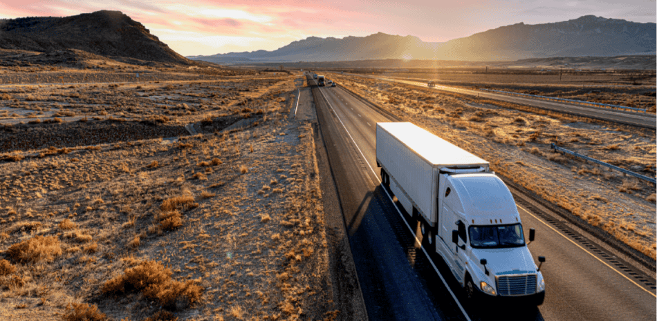 a train is parked on the side of a mountain
